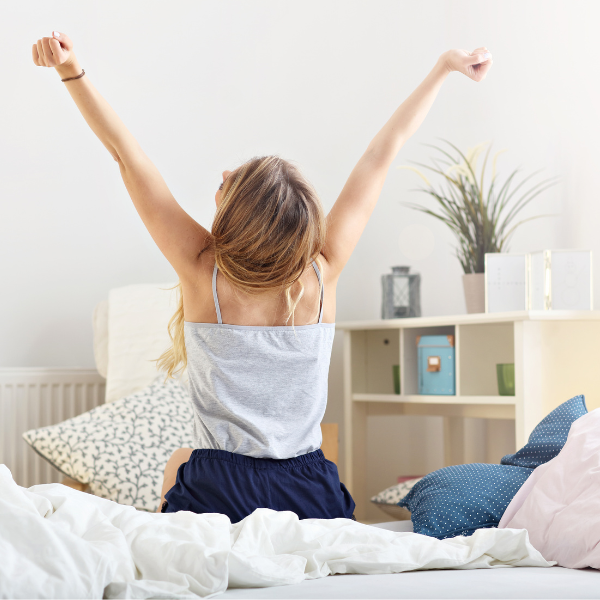 Photo of woman getting up in the morning full of energy